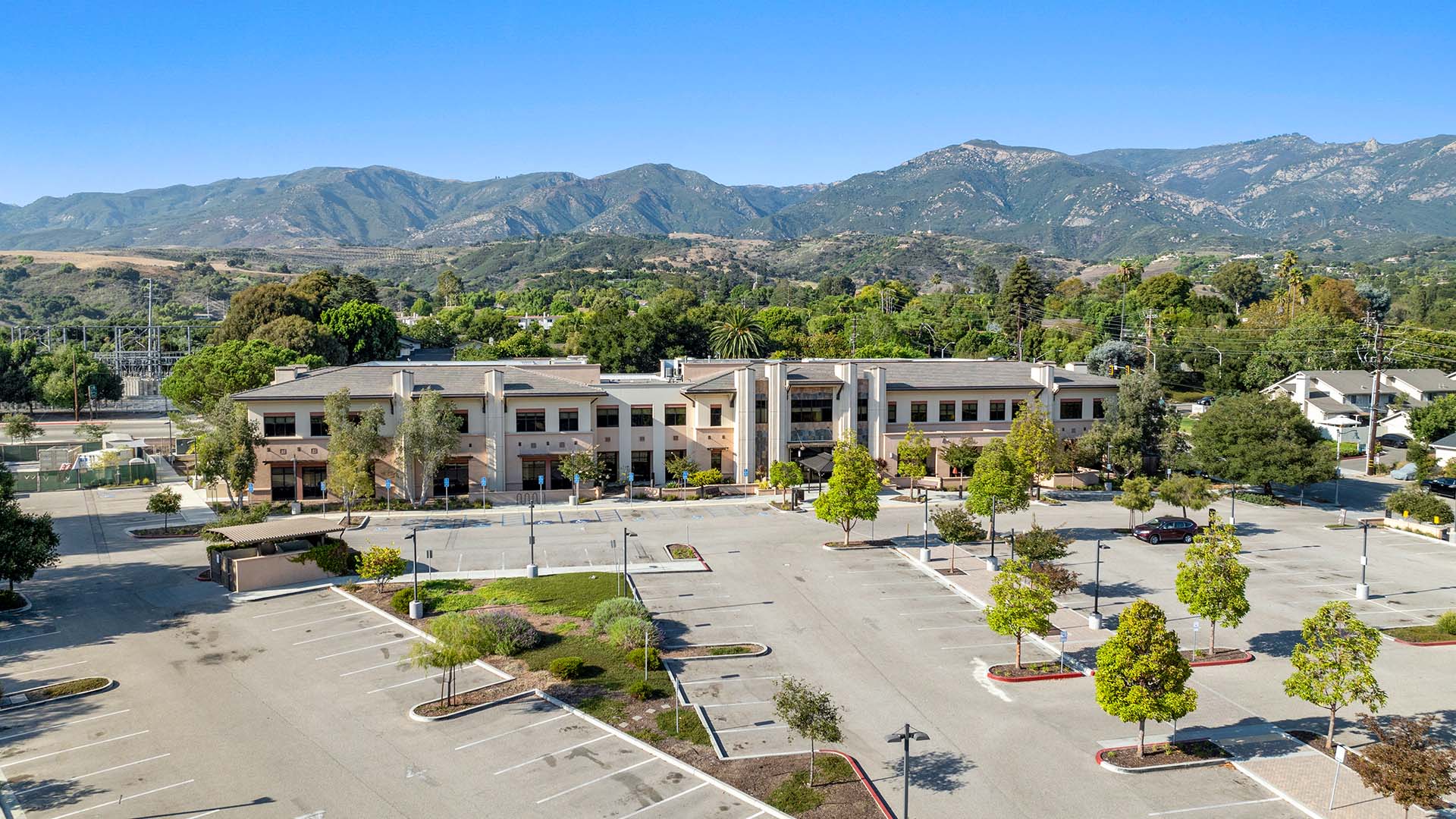 4151 Foothill Road with tall trees and ample parking.